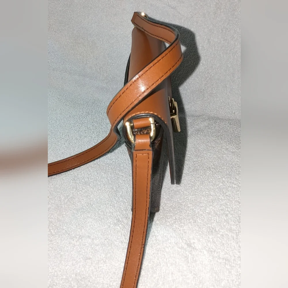 Calvin Klein brown signature Roxy crossbody bag.